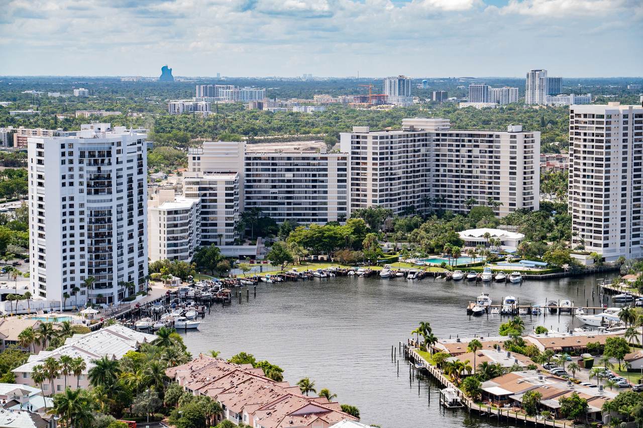 Coastal condominium buildings and boat docks along an intracoastal waterway